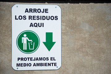 Signage: Throw the waste here. Protect the environment.