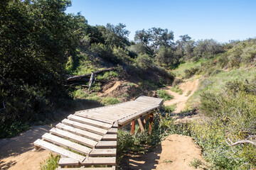 A Back Woods Hiking and Biking Trail in the California Hills with Jumps Built by Local Kids 