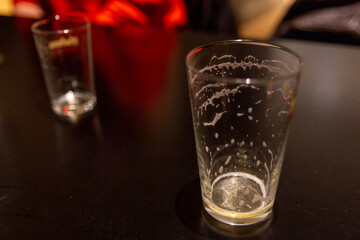 Empty glass glasses of drink on a black table