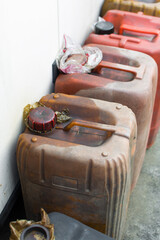 Fuel containers waiting to be filled due to petroleum scarcity in Nigeria, Gasoline containers, fuel jerrycans lined up