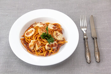 Italian Pasta with Scallop, Tomato Sauce IN A PLATE