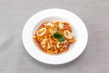 Italian Pasta with Scallop, Tomato Sauce IN A PLATE