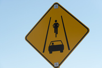 road sign with car and bicycle