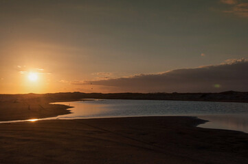 sunset on the beach in praia do cassino