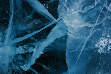 Texture of winter ice surface. Blue natural ice background