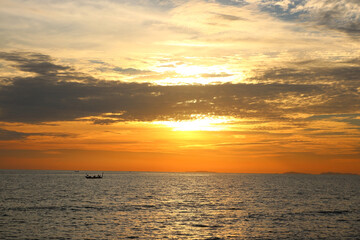 peaceful ocean with beautiful sunset background
