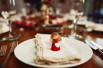Your seat is reserved. Closeup shot of a place setting on a table during Christmas.