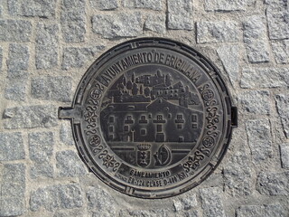 [Spain] Cobblestone road and manhole cover (Frigiliana)