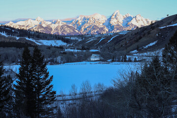 Gros Ventre River Jackson Hole Wyoming  Grand Teton Mountain Range Sunrise Winter Snow