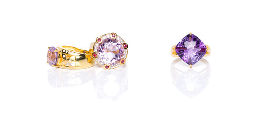 Amethyst, ruby and white zircon  Jewel or gems ring on white background with reflection. Collection of natural gemstones accessories. Studio shot