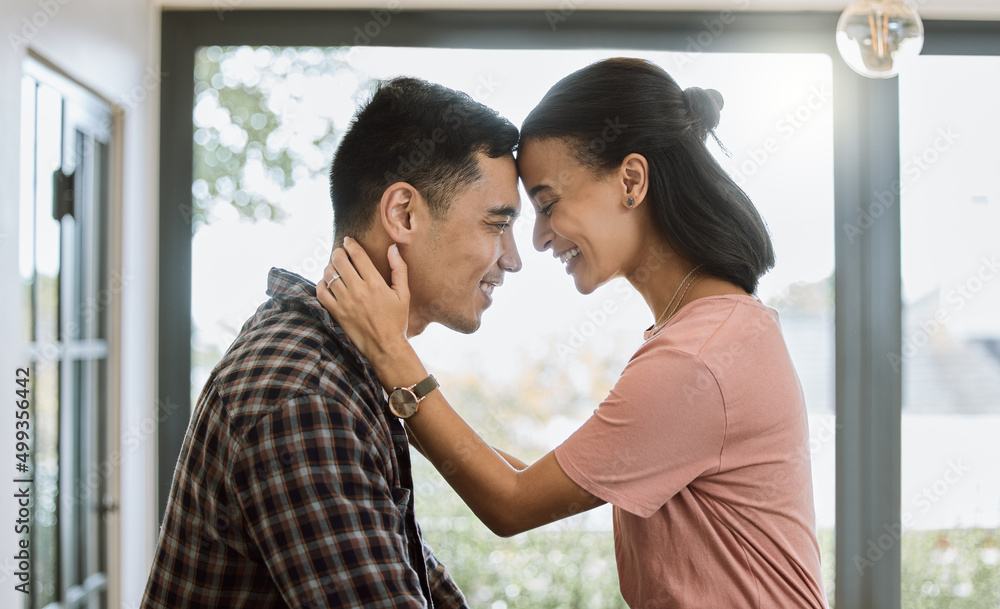 Poster Love is when you accept someones flaws. Shot of a couple spending time together in the kitchen at home.