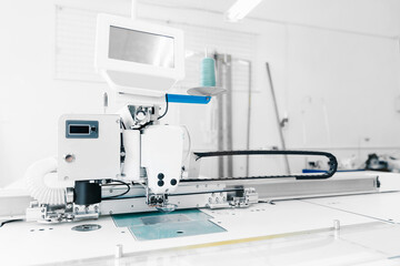 Banner industry tailor sewing machine on table workshop of white background