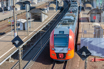 Naklejka premium A modern high-speed train stands at the station.