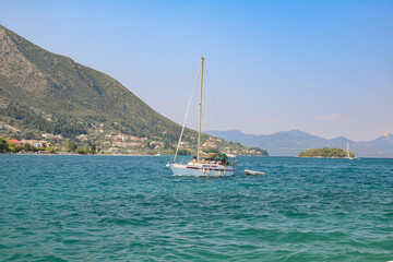 Fototapeta premium view of the sea, boats and mountains, Nidri, Lefkada