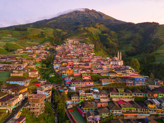 Colorful painted houses in the village are built on the slopes of a mountain. The village was named "Dusun Butuh" nicknamed "Nepal Van Java" which is located on the slopes of Mount Sumbing
