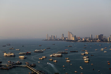 Naklejka premium Aerial panoramic view of Pattaya bay, a coastal touristic city near Bangkok, Thailand, during a hot afternoon.