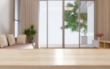 Empty wooden table top with sofa looking outdoor window.Interior blur background.3d rendering