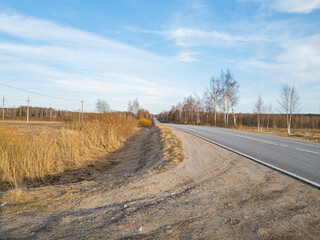 Landscape with a view of the road and the blue sky in spring