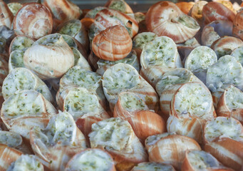 Snails Bourguignonne, a French cuisine dish usually served as an appetizer.