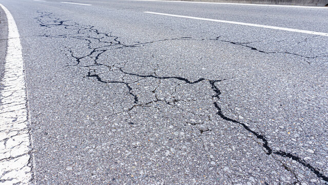 Cracked asphalt road_01