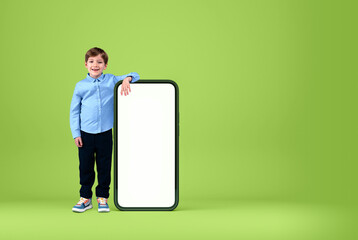 Kid standing near phone mockup display, online education