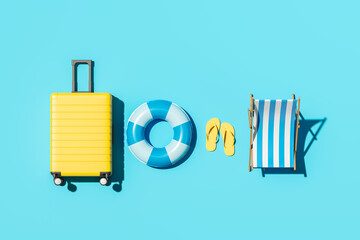 Beach accessories and suitcase. Travel and summer vacation, hotel resort