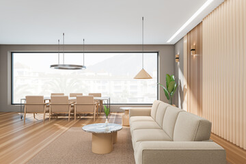 Fototapeta na wymiar Light living room interior with seats and table, panoramic window