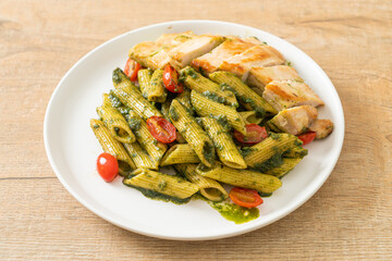 penne pasta in pesto sauce with grilled chicken