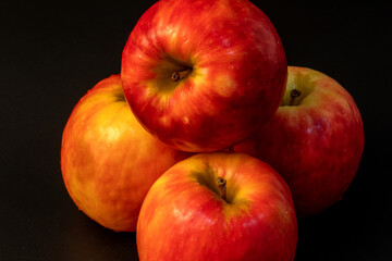 Apple pink lady isolated in black background - using studio lights