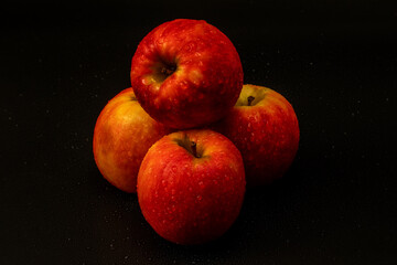 Apple pink lady isolated in black background - using studio lights