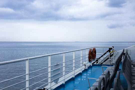 City view of Izmir from ferryboat. Cold grey winter Aegean sea.