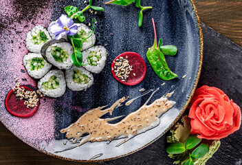 Obraz na płótnie Canvas fish sushi roll in plate