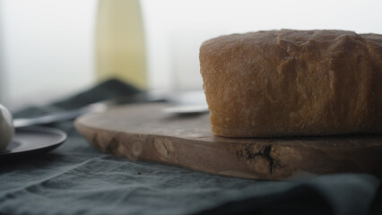sliced ciabatta bread on olive board