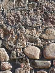 Rough stone wall. Texture of masonry.