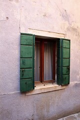 Fototapeta na wymiar Italy, Veneto: Open Window in Burano Island.