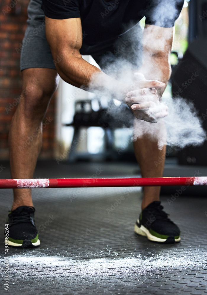 Canvas Prints Give it your best. Cropped shot of a man dusting his hands with chalk powder at the gym.