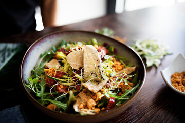 Bowl of fresh, raw and healthy salad. Vegetarian and nutritious food.