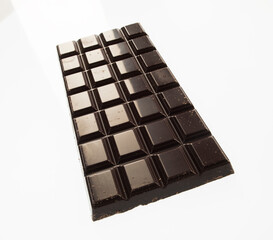chocolate bar on white background macro