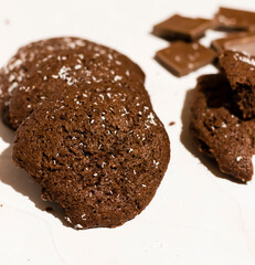 Chocolate chip cookies with coconut. Lying on a white background