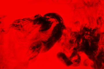 Black and red ink background, colorful fog, abstract swirling ocean, acrylic paint pigment underwater, dark smoke