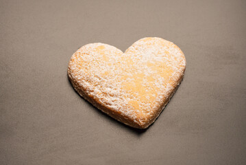 Shortbread in the shape of a heart isolated on white background.