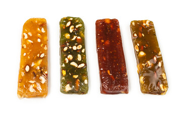 Turkish traditional delight with nuts isolated on white background.
