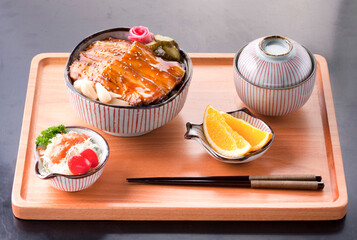 Japanese roast pork belly on a wooden plate