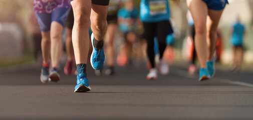 Marathon running race, people running on city road