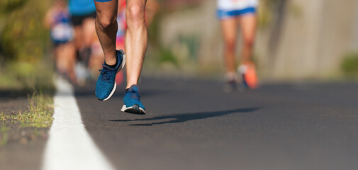 Marathon running race, people running on city road