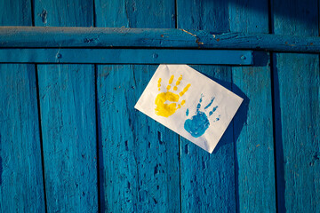Love Ukraine concept. Hands painted in Ukraine flag color - yellow and blue. Independence day of Ukraine, Flag, Constitution day Education, school, art painitng concept

