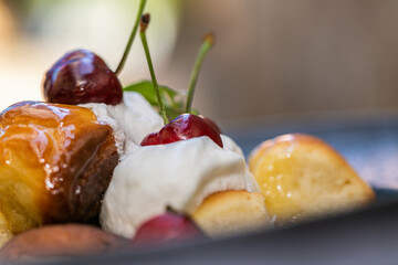 The homemade buns. Homemade delish dessert, vanilla sauce, fresh fruit. Close up