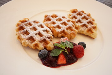 Waffle on white plate with blueberry jam - 白い皿 ワッフル ブルーベリー ジャム
