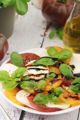 A plate with Italian salad caprese