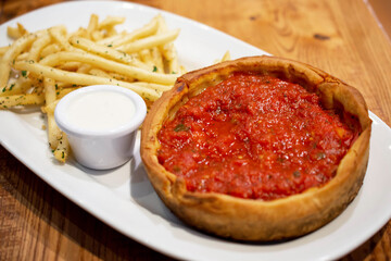 The Deep dish pizza, Chicago-style pizza.